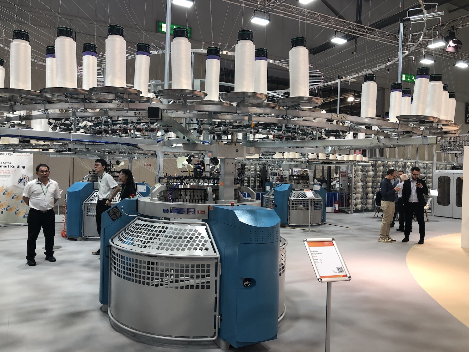 Pailung machines on show in Milan. © Knitting Industry