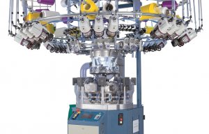 The SM8-TOP2V 28-gauge knitting machine by Santoni (A). A detailed